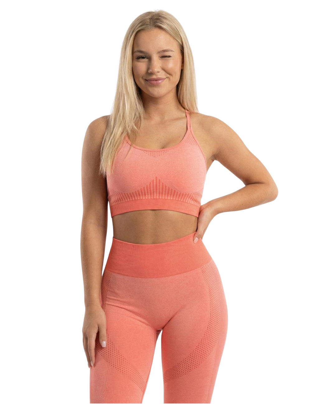 Conjunto deportivo con diseño de líneas y puntos legging + top