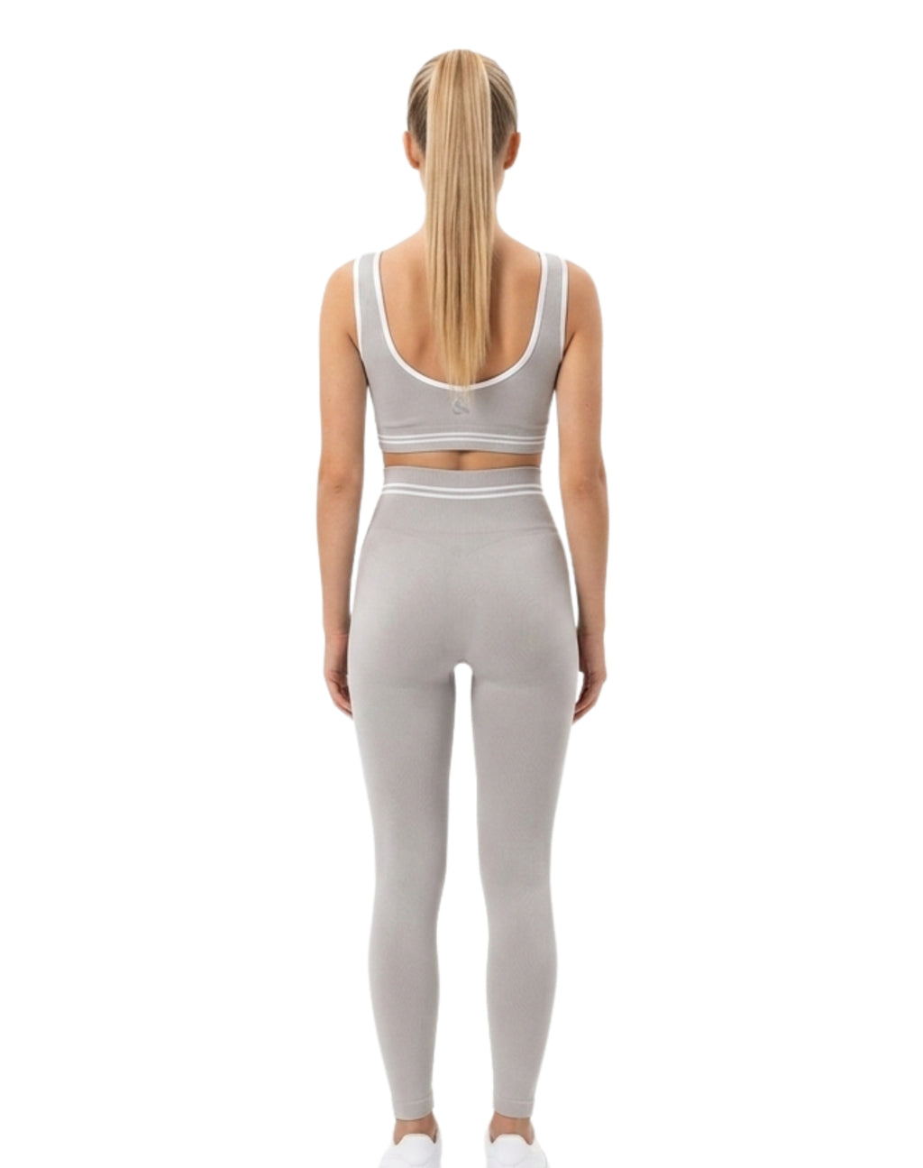 Conjunto deportivo de diseño trazado y líneas legging + top